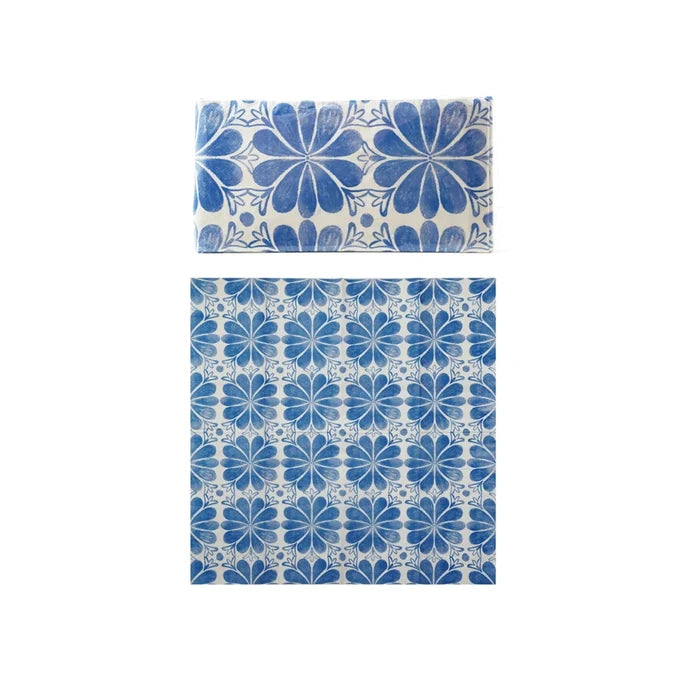 Blue floral patterned pillowcase and duvet cover set on a white background