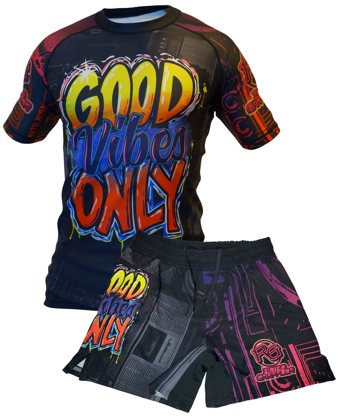The Good Vibes Kit by Retro Grappler is a matching athletic shirt and shorts set with a graffiti-style “GOOD VIBES ONLY” design, inspired by the Good Vibes BJJ rash guard, set against a dark tech background with red and purple accents.