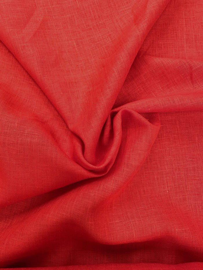 A midweight handkerchief linen in a beautiful candy red color, ruffled.