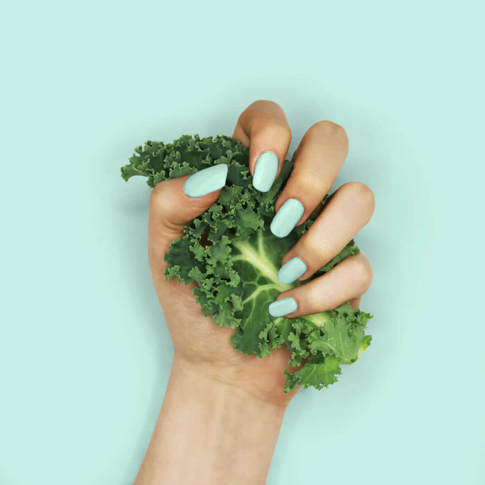 Nails painted with non-toxic, mint green nail polish with kale protein infusion.