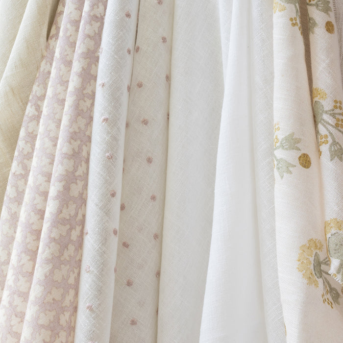 Quinn Wisteria Sheer Roman Shade in ivory floral sheer fabric, made to order in the USA with short lead times