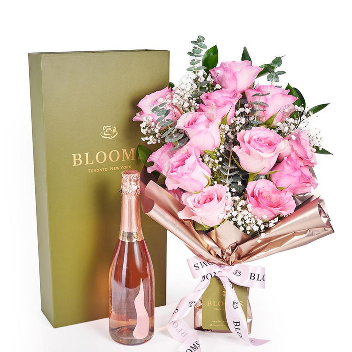 Mother's Day Pink Rose Bouquet Featuring Premium Champagne – gift basket with this gift includes a dozen pink roses with