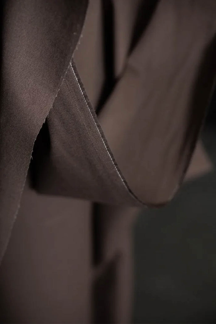 close up of brown twill fabric roll