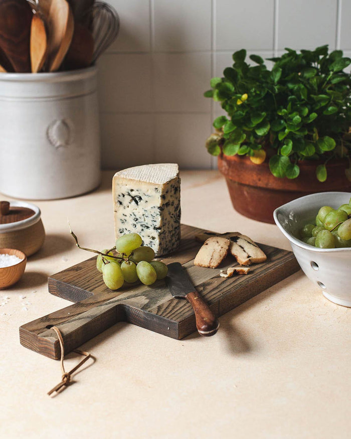 Pantry Ash Cutting Board — board on a kitchen counter with cheese; Farmhouse Pottery