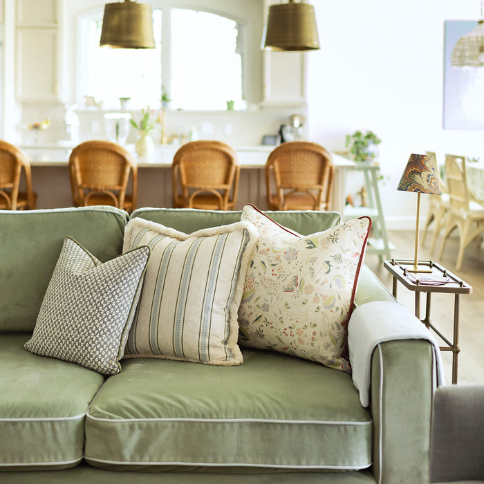 Gemma Pear TEST throw pillow on a sage green sofa, made to order in the USA with short lead times