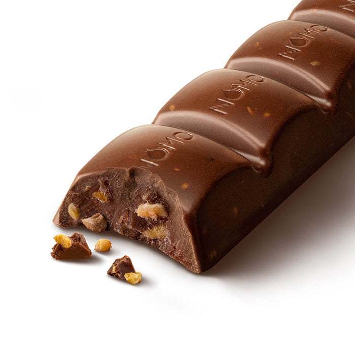 Close up view of nomo salted popcorn chocolate bar.
