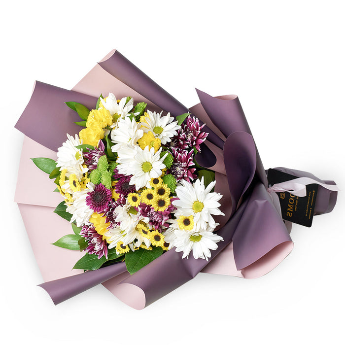 Vibrant Mixed Colored Daisies Bouquet Wrapped with Designer Ribbon – the bouquet
