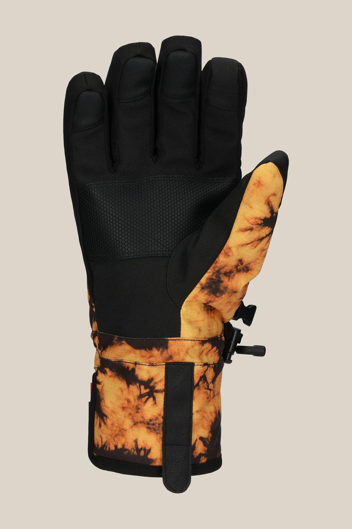The 686 Mens Infiloft Recon Glove features black fingers and palm, an orange tie-dye wrist and thumb, PU construction, adjustable strap, and drawstring closure for a secure winter fit.