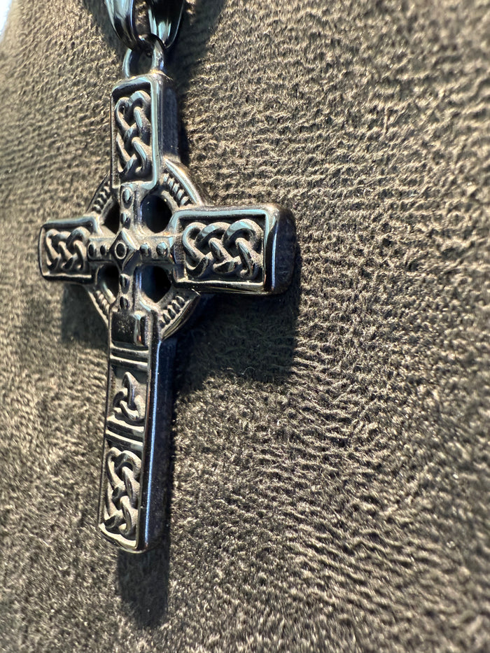 Black cross pendant on a black box link chain