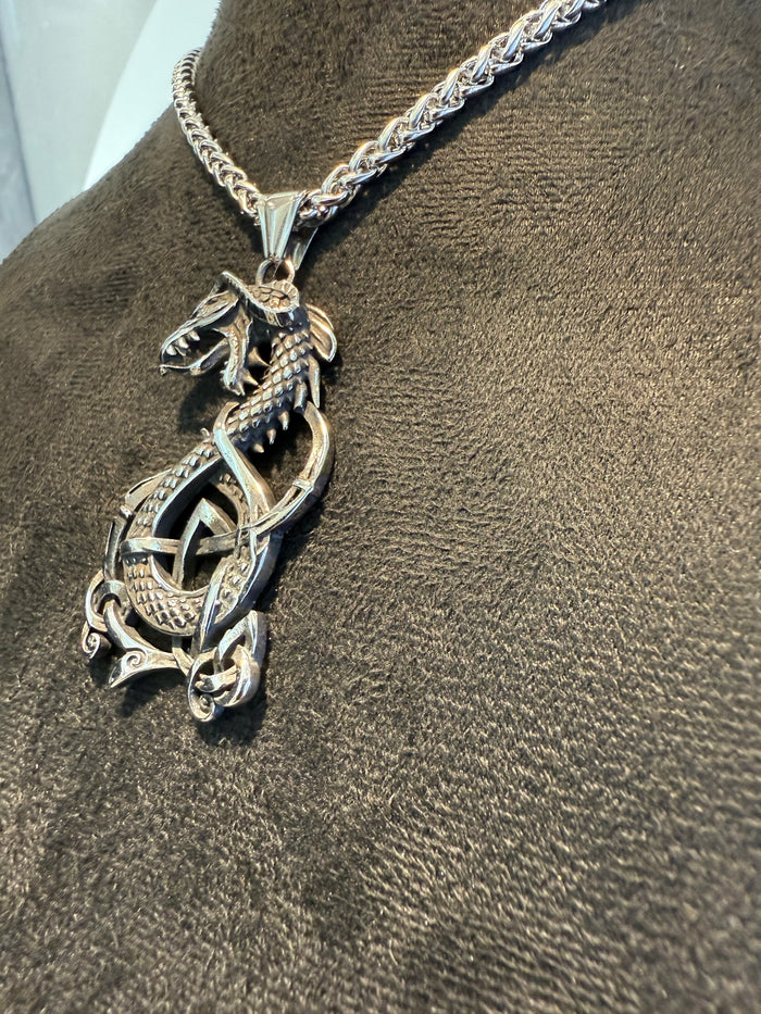 Silver titanium dragon knot pendant necklace on a titanium serpentine link chain