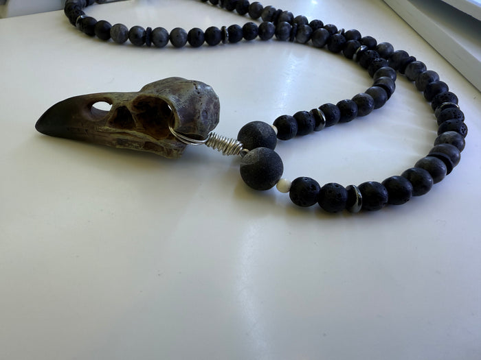 One of a kind necklace with black agate beads and hematite spacers and a raven skull pendant