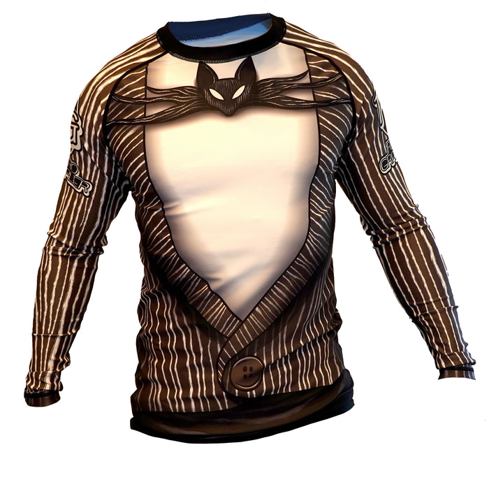 The Retro Grappler Bone Daddy Rash Guard is a long-sleeve jiu jitsu top styled like a tuxedo with brown and white pinstripes, bow tie, and buttons for a formal look on athletic fabric.