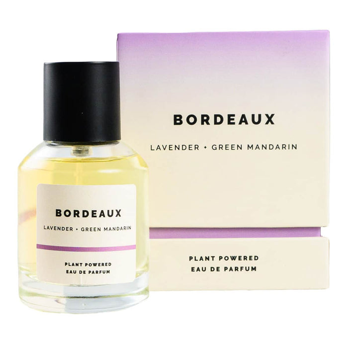 ECO. Modern Essentials Bordeaux plant-powered eau de parfum 50ml bottle & packaging on a white background.