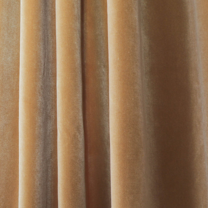 Close-up of Camel Velvet fabric in warm golden tones, showcasing soft texture for custom Pepper Home curtains.