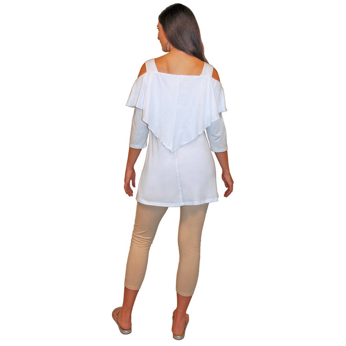 Back view of a woman wearing a white, 3/4 sleeve, flowy top with shoulder cutouts and hem that ends at the top of the thigh, and beige capri pants on a white background.