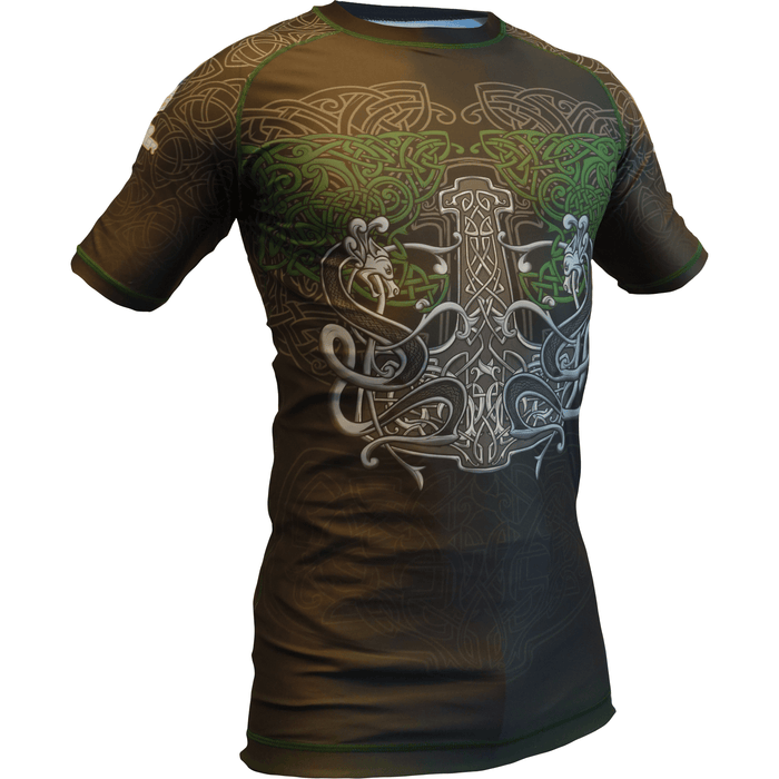 The Retro Grappler Celtic Luck Jiu Jitsu Rash Guard is a fitted short-sleeve shirt with green and brown Celtic knot designs and a bold metallic Thors hammer—perfect for grappling, wrestling, or MMA.