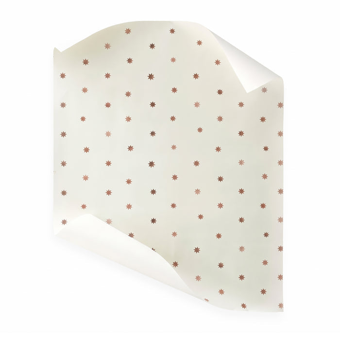 Charlie Copper wallpaper in cream with copper starburst pattern, made-to-order in the USA with short lead times