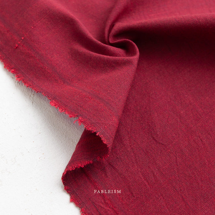 Close-up of red fabric on a white background
