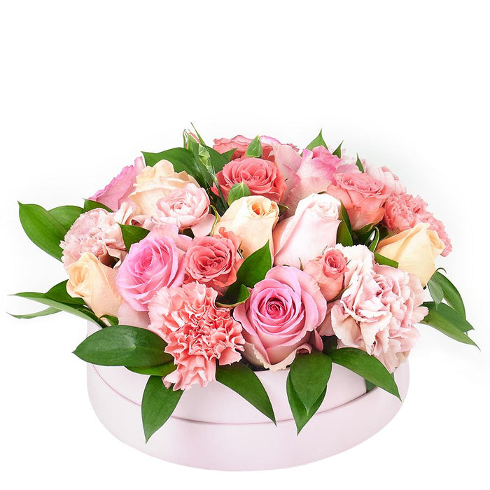Deluxe Pink and Purple Roses Mixed Arrangement in Green Hat Box – gift basket with this lively bouquet adds a touch of freshness and this arrangement