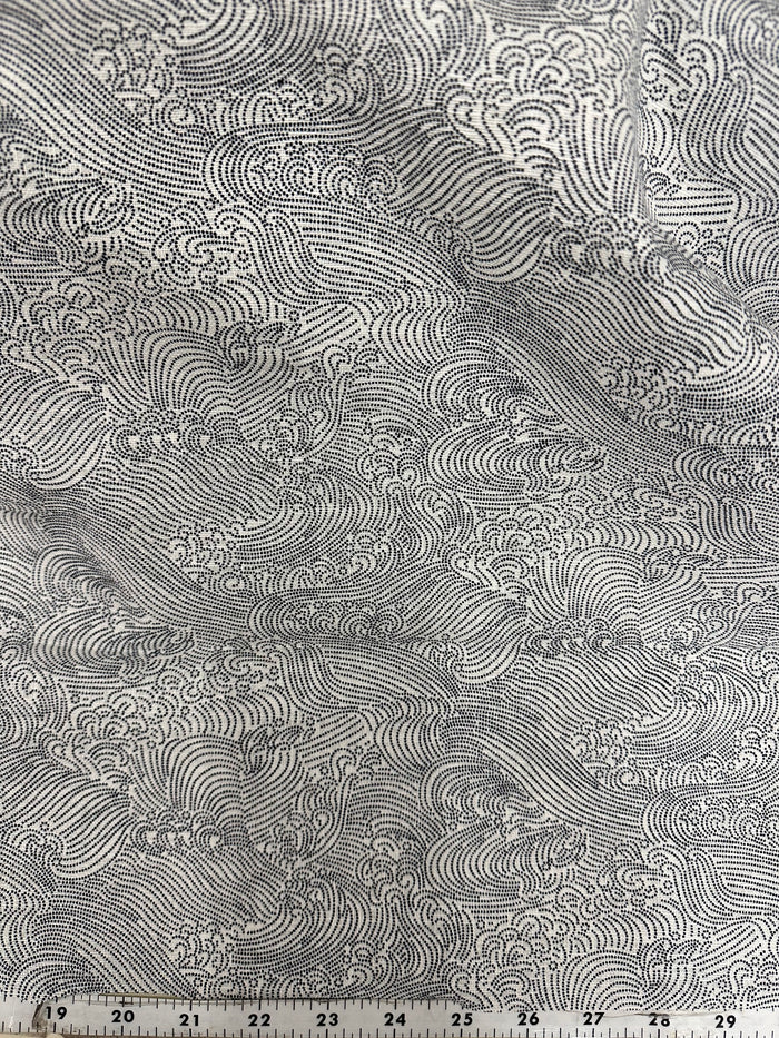 Textured fabric with wave pattern and measurement scale at the bottom