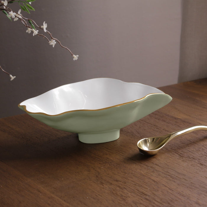 Beatriz Ball Encanto Claire Small Oval Bowl with Spoon — Empty bowl with the spoon beside it