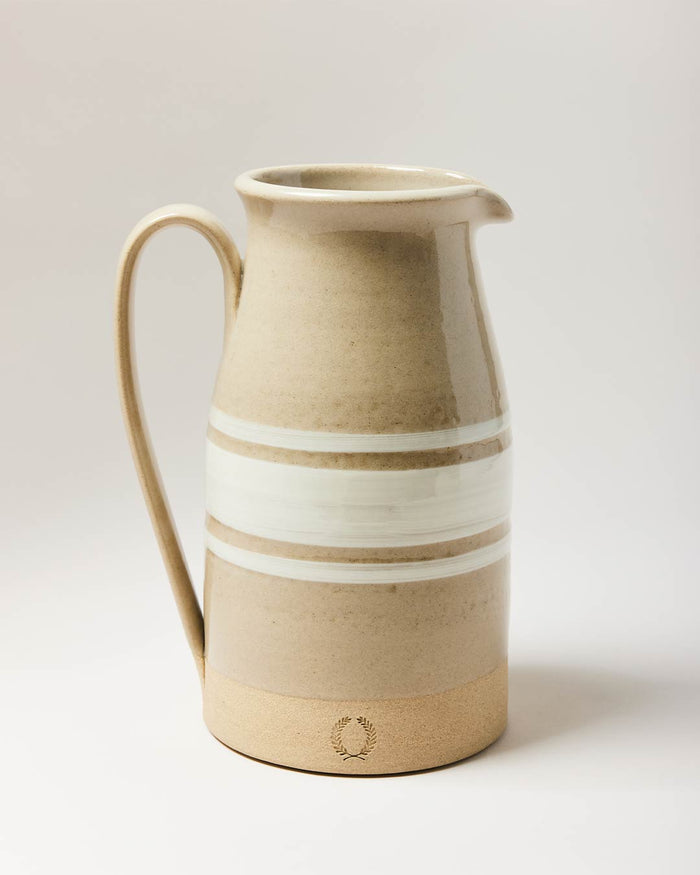 Farmhouse Yellowware Stoneware Pitcher — large pitcher shown individually; Farmhouse Pottery