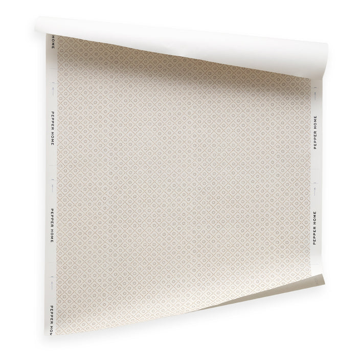 Goldie Stone wallpaper with a subtle repeating geometric diamond pattern in soft beige tones, customizable design.