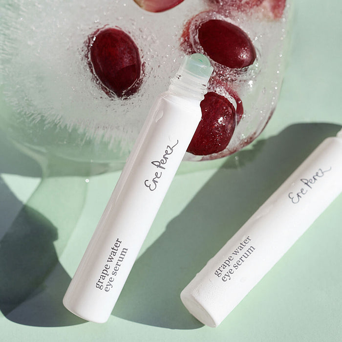 8ml Ere Perez Grape Water Eye Serum with a jade roller applicator.