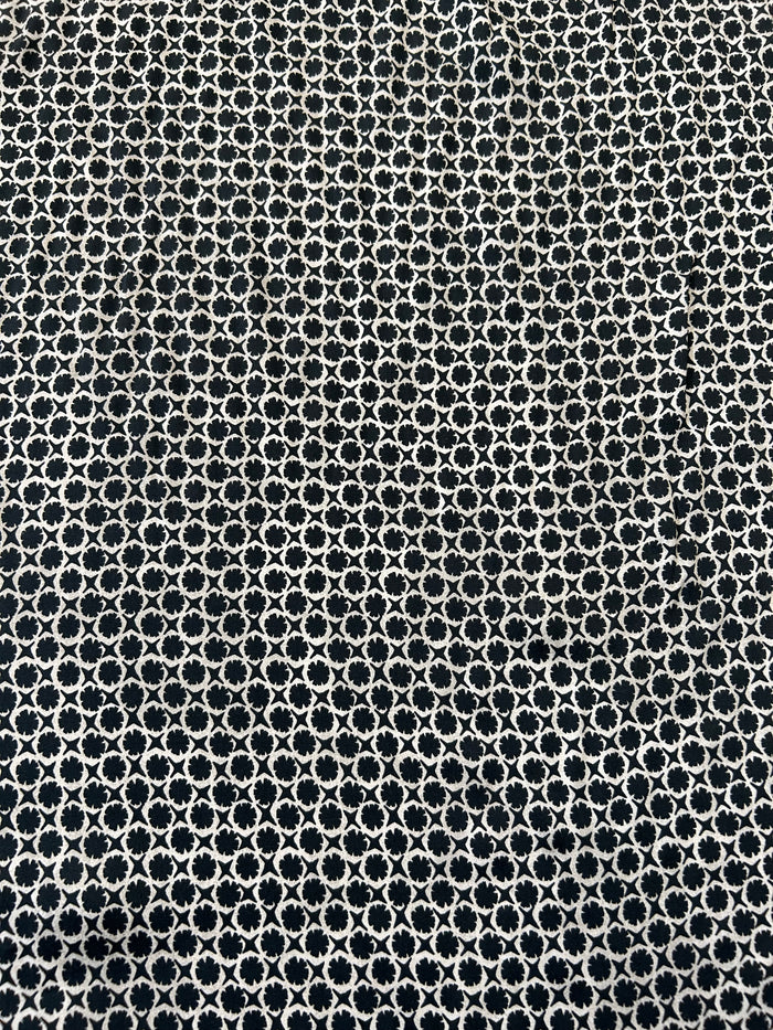 vintage-style, black and tan geometric print, made of viscose with a satin finish.