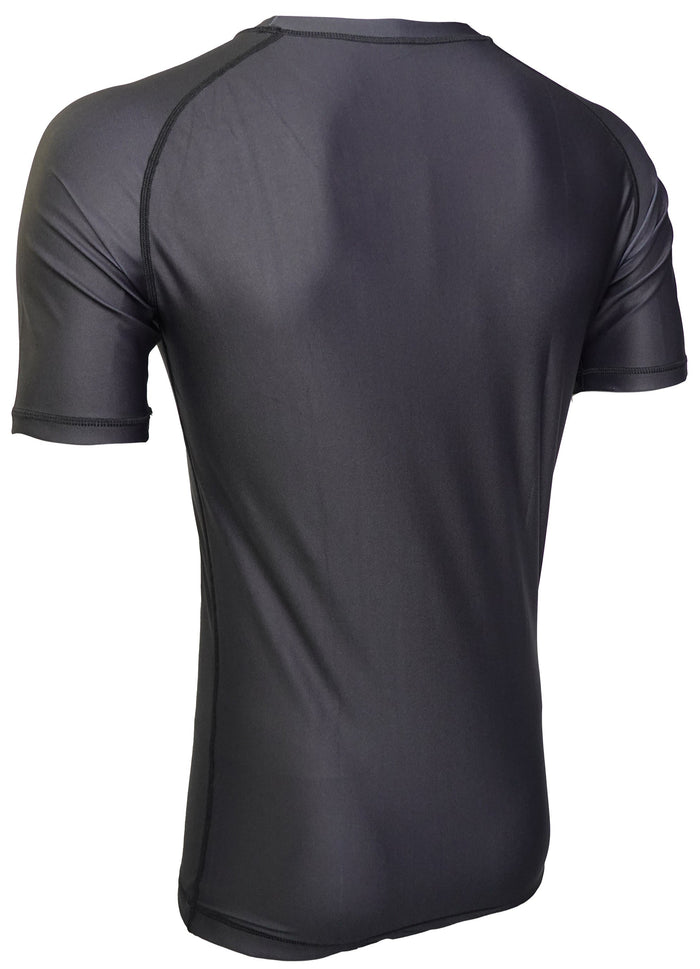 The Retro Grappler Just a black rash guard for Jiu Jitsu and MMA features smooth, fitted fabric with minimal seams and advanced Grappler Gripper tech—perfect for training or competition.