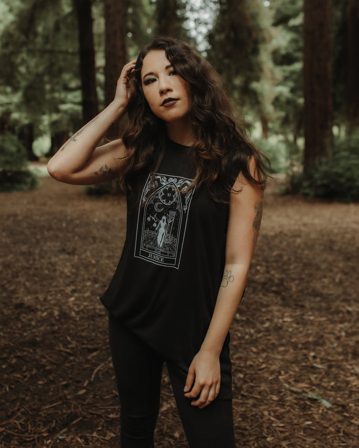 Model wearing the Justice Tank by The Pretty Cult, black cotton tarot graphic tank top
