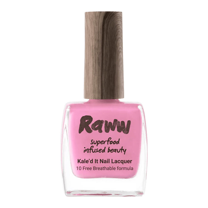 Bottle of non-toxic, bright candy pink nail polish with kale protein infusion.
