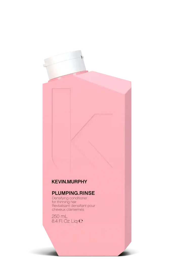 Pink bottle of Kevin Murphy Plumping Rinse on a white background - Hair Care Canada