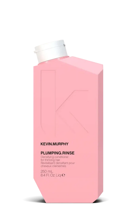 Pink bottle of Kevin Murphy Plumping Rinse on a white background - Hair Care Canada