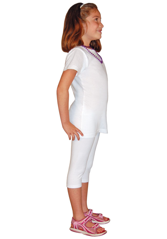 Side view of a child wearing white capri-length leggings and a white t-shirt.