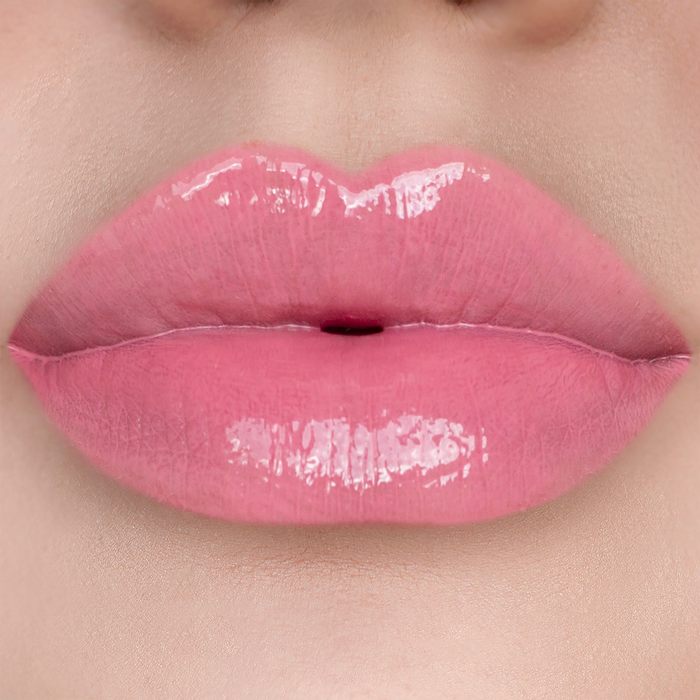 Lip to Lip rosy pink lip gloss on lips, light skin tone