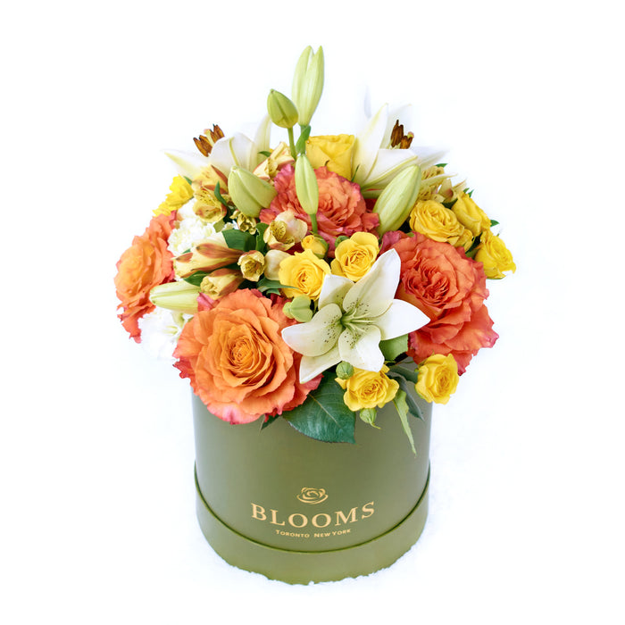 Luxurious Multi-Hued Rose and Lily Mixed Arrangement – gift basket with this arrangement features beautiful roses and this arrangement includes