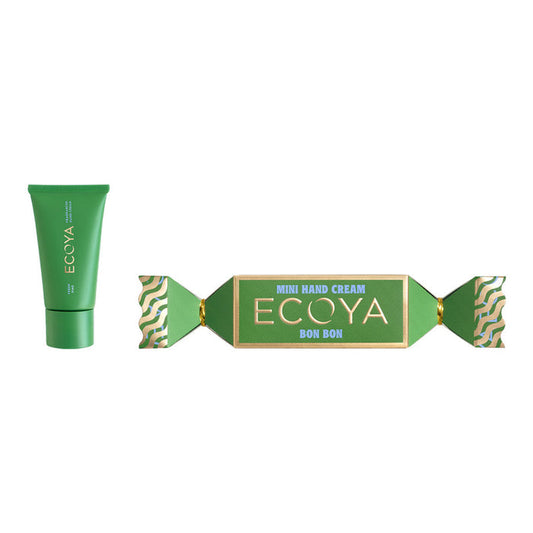 Green hand cream and box with ECOYA branding on a white background.
