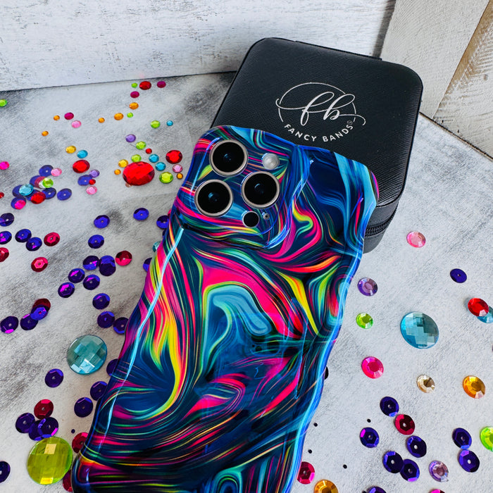 Neon Taffy Wavy Luxe MagSafe Case for iPhone â The fluid marble design features hypnotic swirls and waves in electric neon colors that shift and flow across your phone like melted taffy or liquid art.