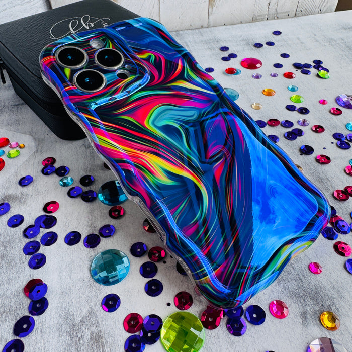 Neon Taffy Wavy Luxe MagSafe Case for iPhone â The fluid marble design features hypnotic swirls and waves in electric neon colors that shift and flow across your phone like melted taffy or liquid art.