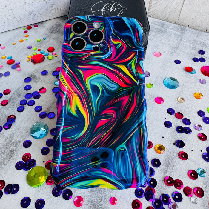 Neon Taffy Wavy Luxe MagSafe Case for iPhone â The fluid marble design features hypnotic swirls and waves in electric neon colors that shift and flow across your phone like melted taffy or liquid art.