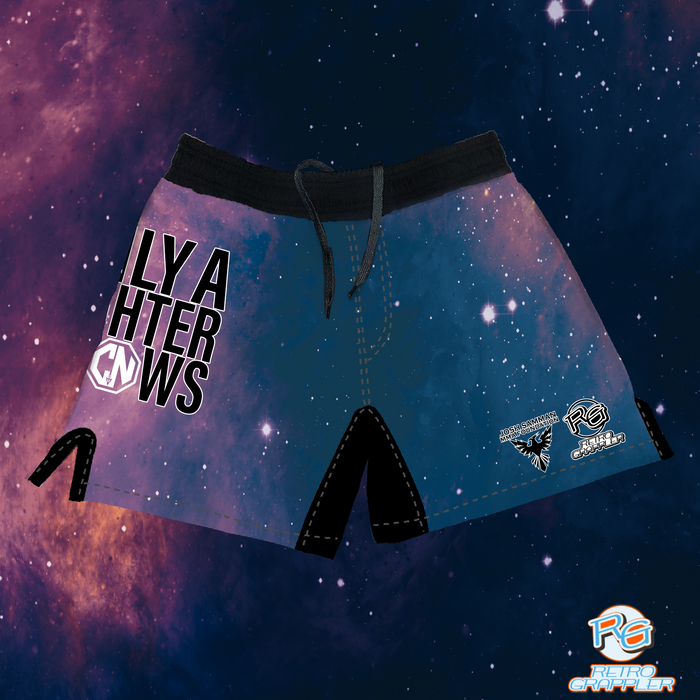 The Retro Grappler Only a Fighter Knows Galaxy Grappling Shorts feature a pink and blue galaxy print, black trim, a fitted four-way stretch design, LYAHTERNWS on the left, white logos on the right leg, and a space-themed background.