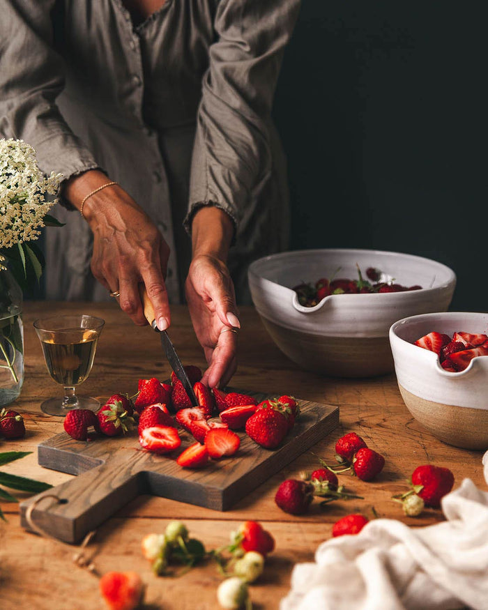 Pantry Ash Cutting Board — chopping strawberries on a board; Farmhouse Pottery