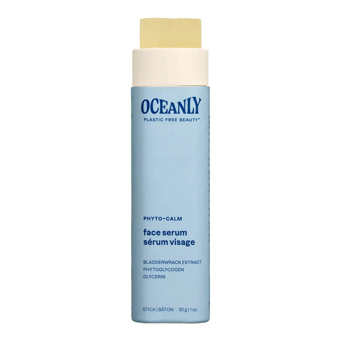 Blue face serum bottle with beige cap on a white background.