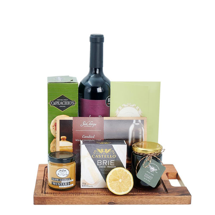 Premium Red Wine with Brie and Smoked Salmon Basket – gift basket with castello brie, wildflower orchards avocado honey and capeachio's vegetable