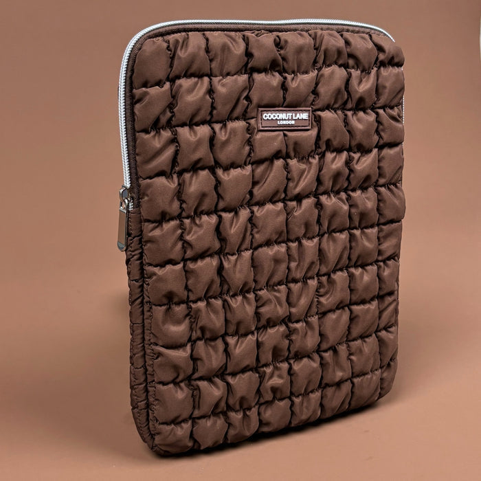 Brown quilted iPad sleeve with padded texture and sleek finish from Coconut Lane.