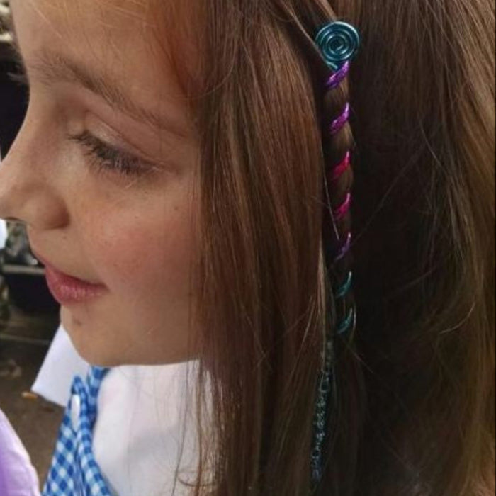 Model wearing Rainbow Hair Twister - 4" Blue Spiral Wrap Ponytail Accessory