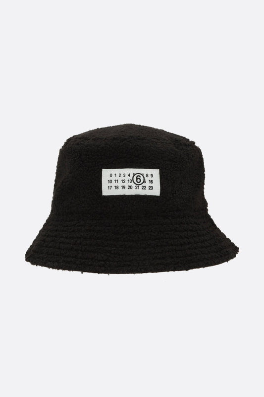 reversible bucket hat in teddy and nylon