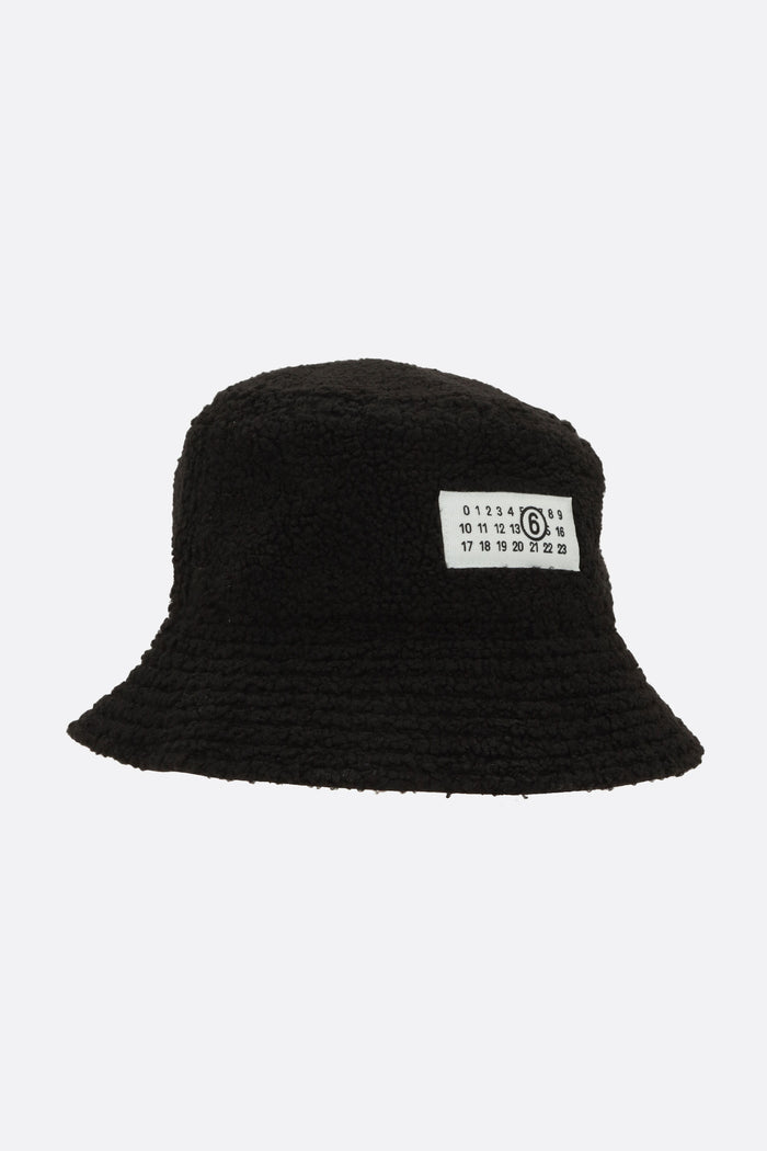 reversible bucket hat in teddy and nylon