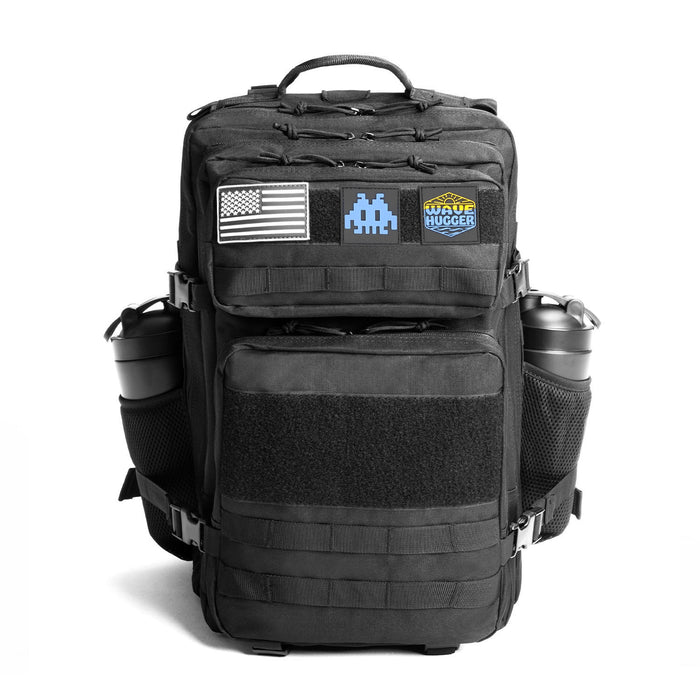 Black tactical backpack with various patches on a white background